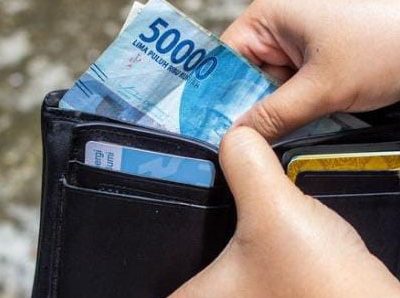 Ilustrasi. Dugaan pungutan liar (pungli) berkedok penarikan pajak retribusi di ruas jalan Mercedes-Benz oleh oknum